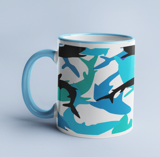 Blue Reef Sharks mug on a light blue background, with a light blue handle and rim.