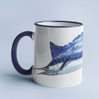 Blue marlin design on white coffee mug with navy handle.