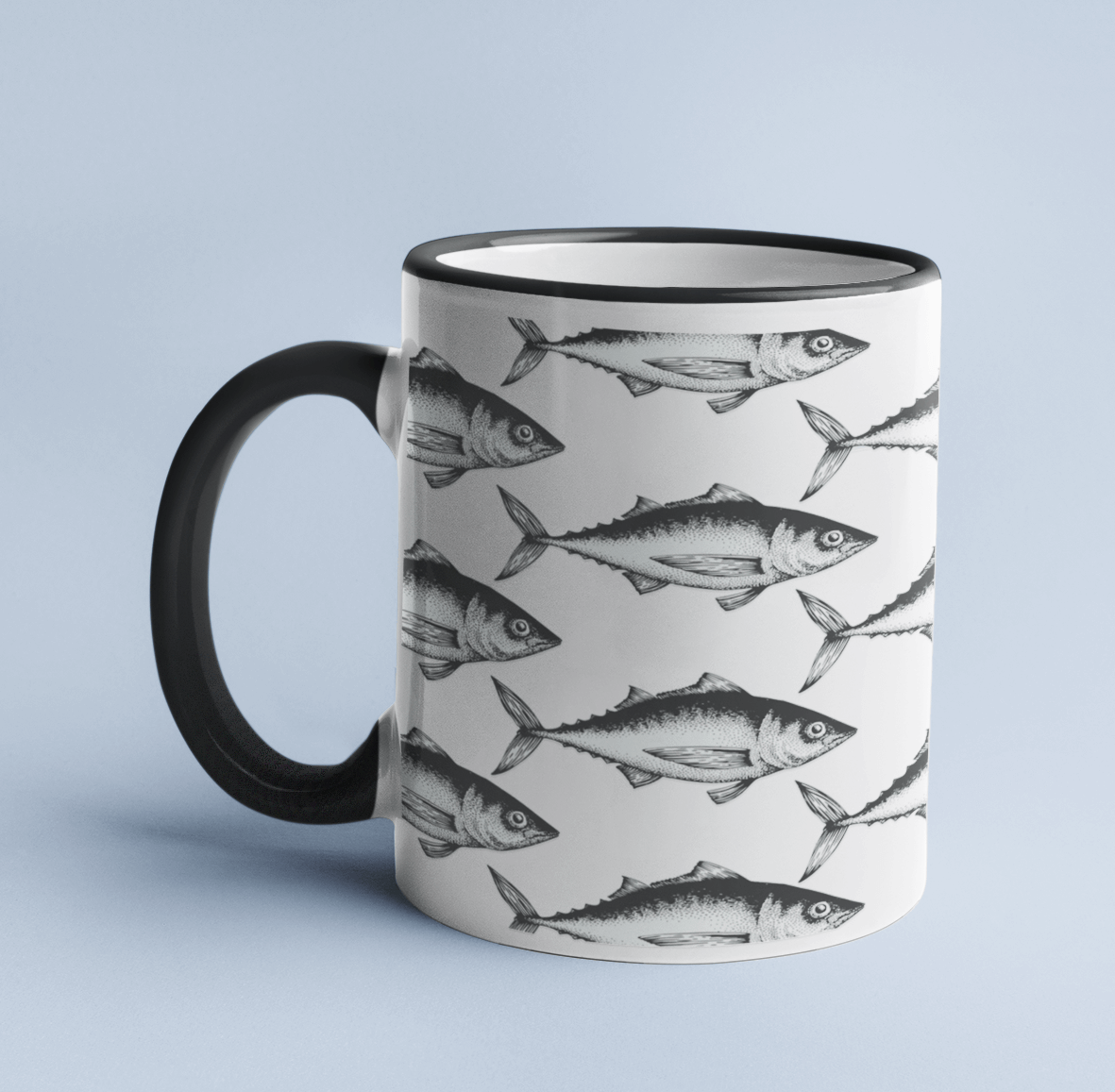 Sardine mug on a light blue background, with a black handle and rim.