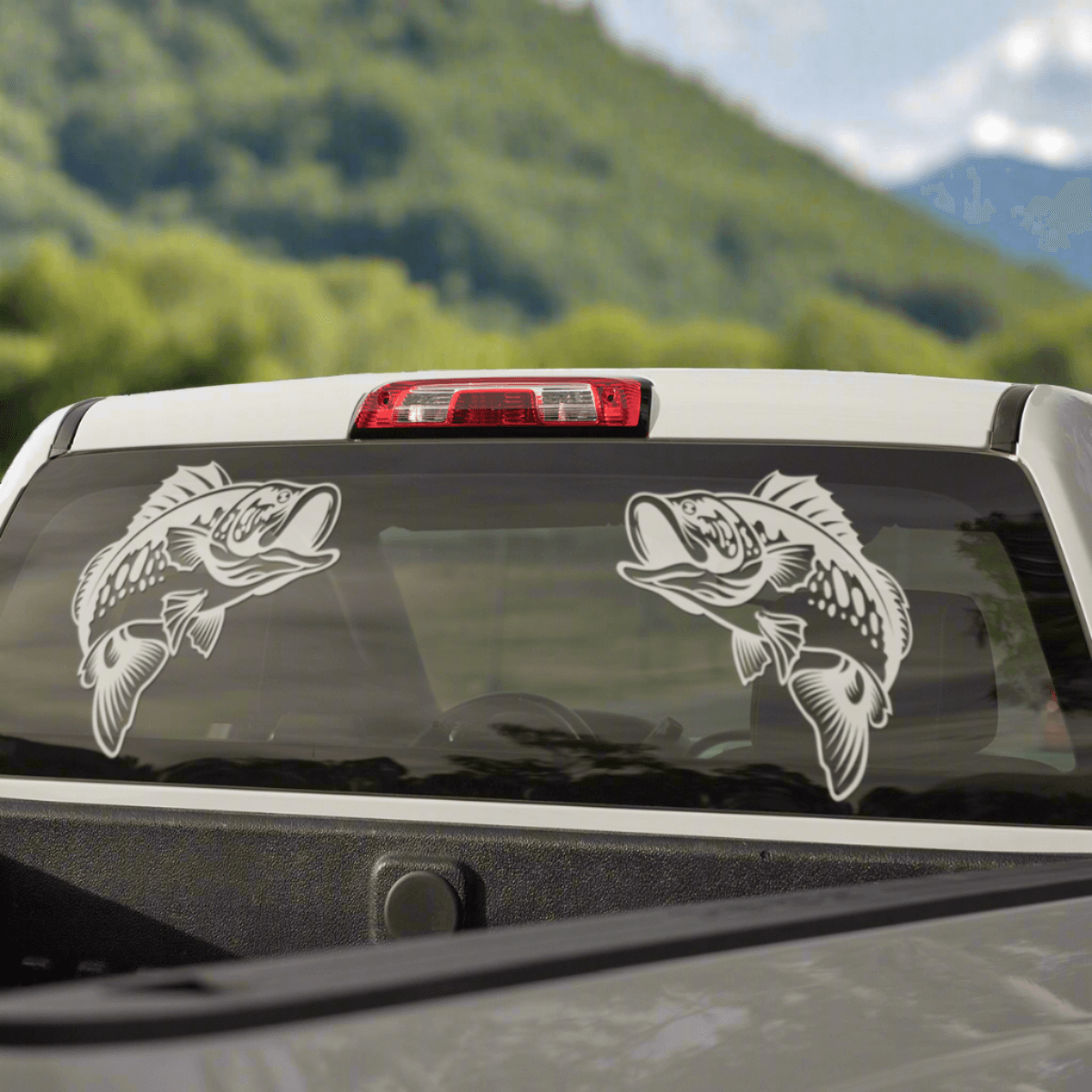 Customizable Smallmouth Bass vinyl decals on truck window, perfect for fishing enthusiasts. Sizes 14"-70". Fish decals for trucks available.