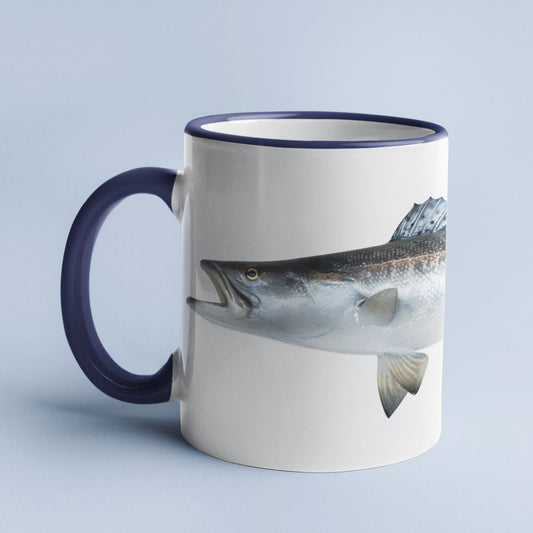 Spotted Seatrout accent mug with dark blue handle on light blue background.