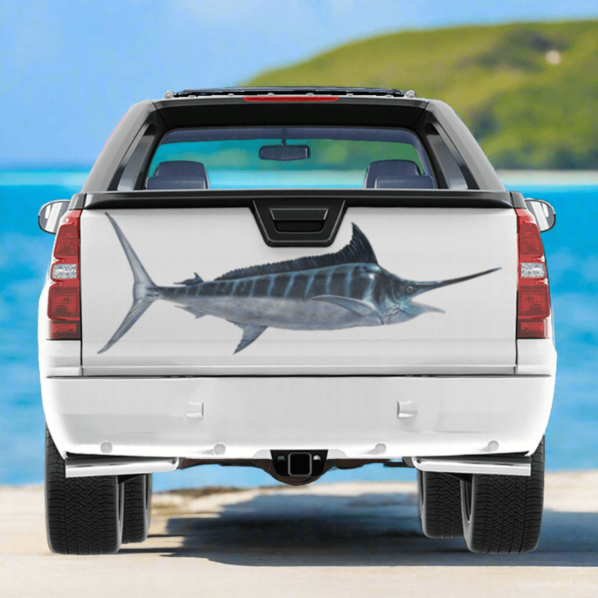 Striped Marlin large decal on a pickup truck, parked by the ocean.