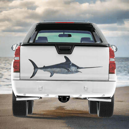 Swordfish large decal on a pickup truck parked on a beach.