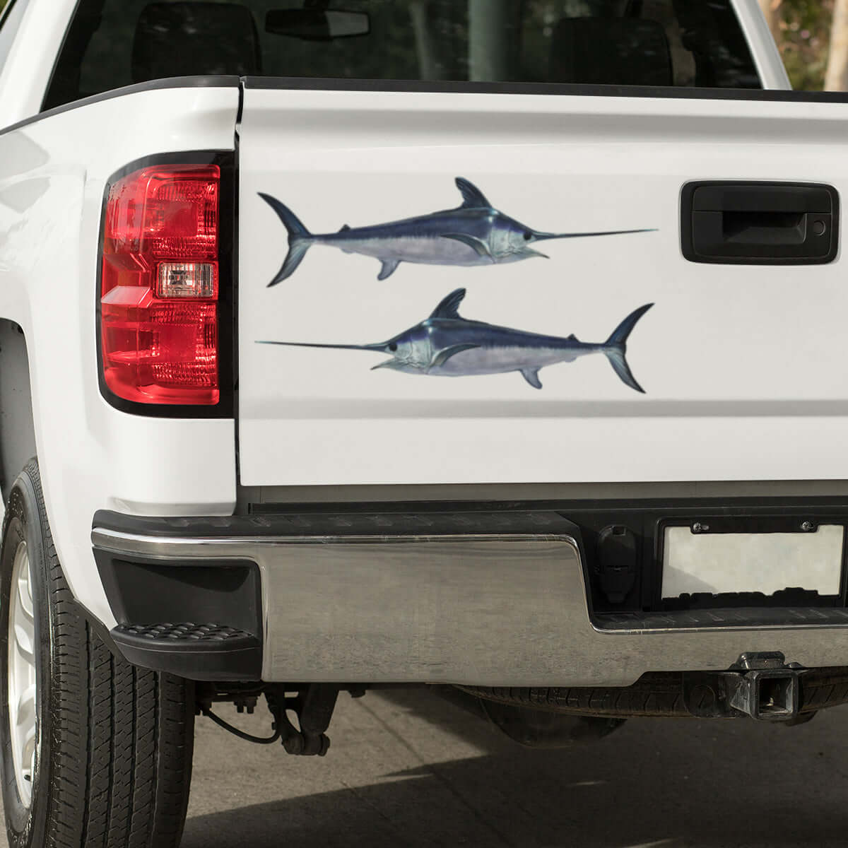 Swordfish large decals on a pickup truck.