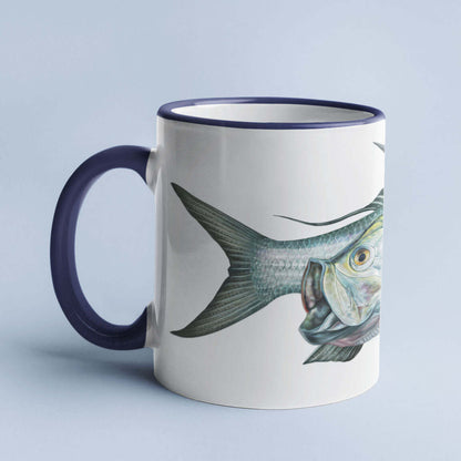 Ceramic mug with a detailed illustration of a fish, featuring a dark handle and rim on a light background.