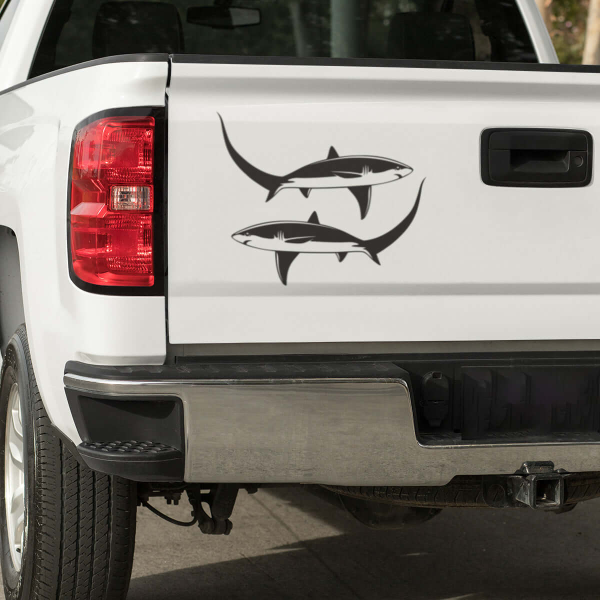 Large Thresher Shark decals on a pickup truck.