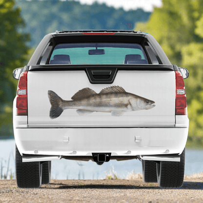 Walleye decals on a pickup truck by a large river.