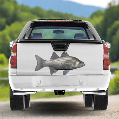 White Bass large decal on a pickup truck near a river.