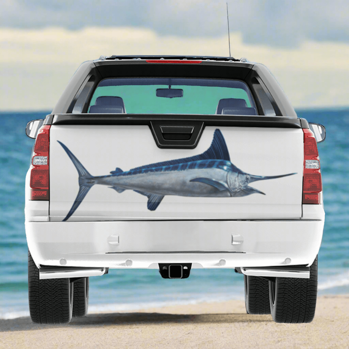 White Marlin large decal on a pickup truck by the ocean.