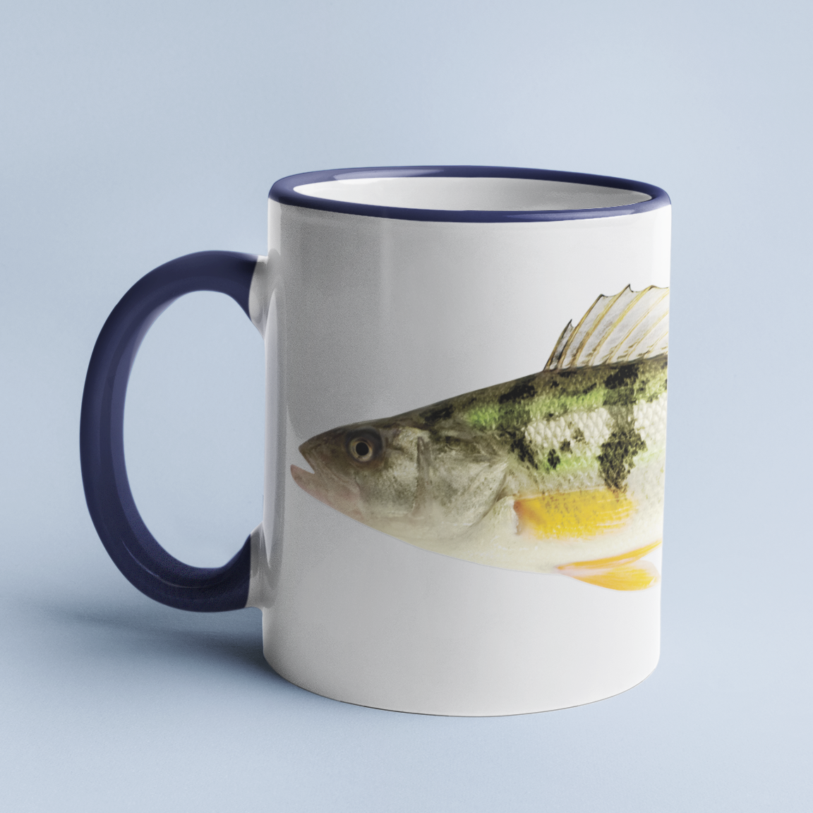 Yellow Perch accent mug with dark blue handle on light blue background.