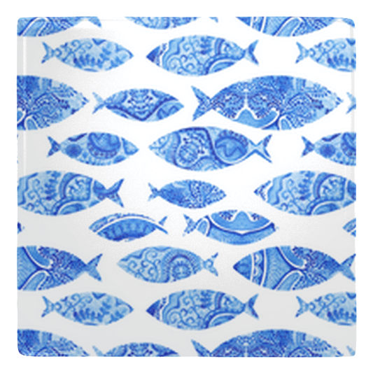 Blue fish-patterned magnets add oceanic charm to your fridge. Perfect for fun kitchen decor.