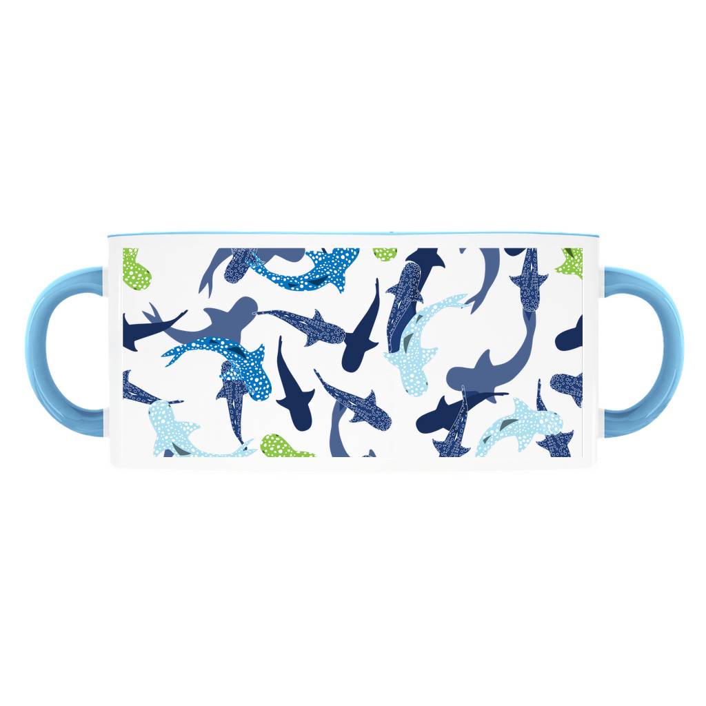 Reef Sharks Design mug on a light blue background, with a light blue handle and rim.