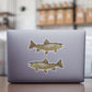 Brown Trout stickers on a laptop.