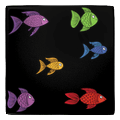 Colorful fish shaped magnets on black background, perfect for fun kitchen décor.