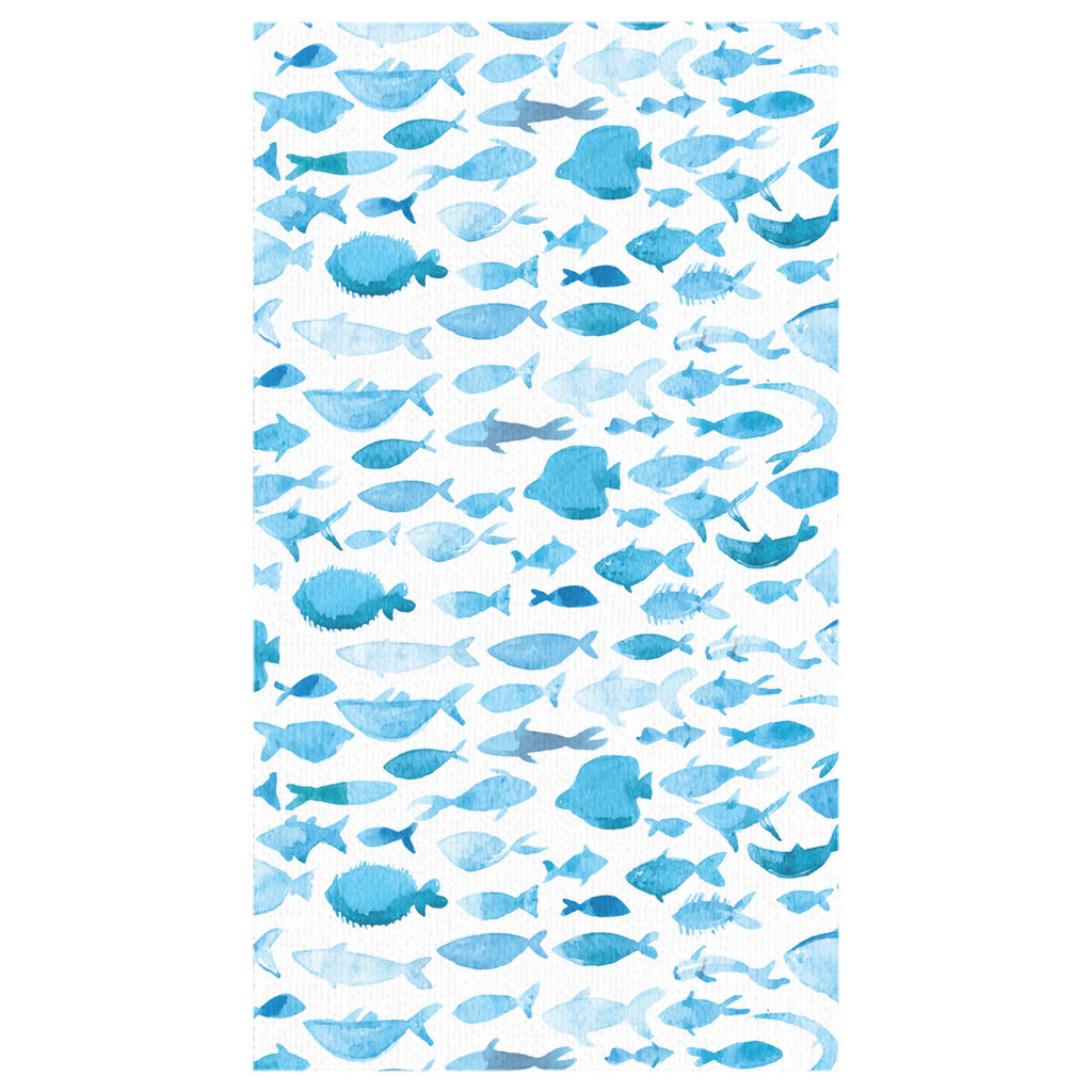 Watercolor fish decor tablecloth in blue and white for a stylish aquatic-themed dining table.