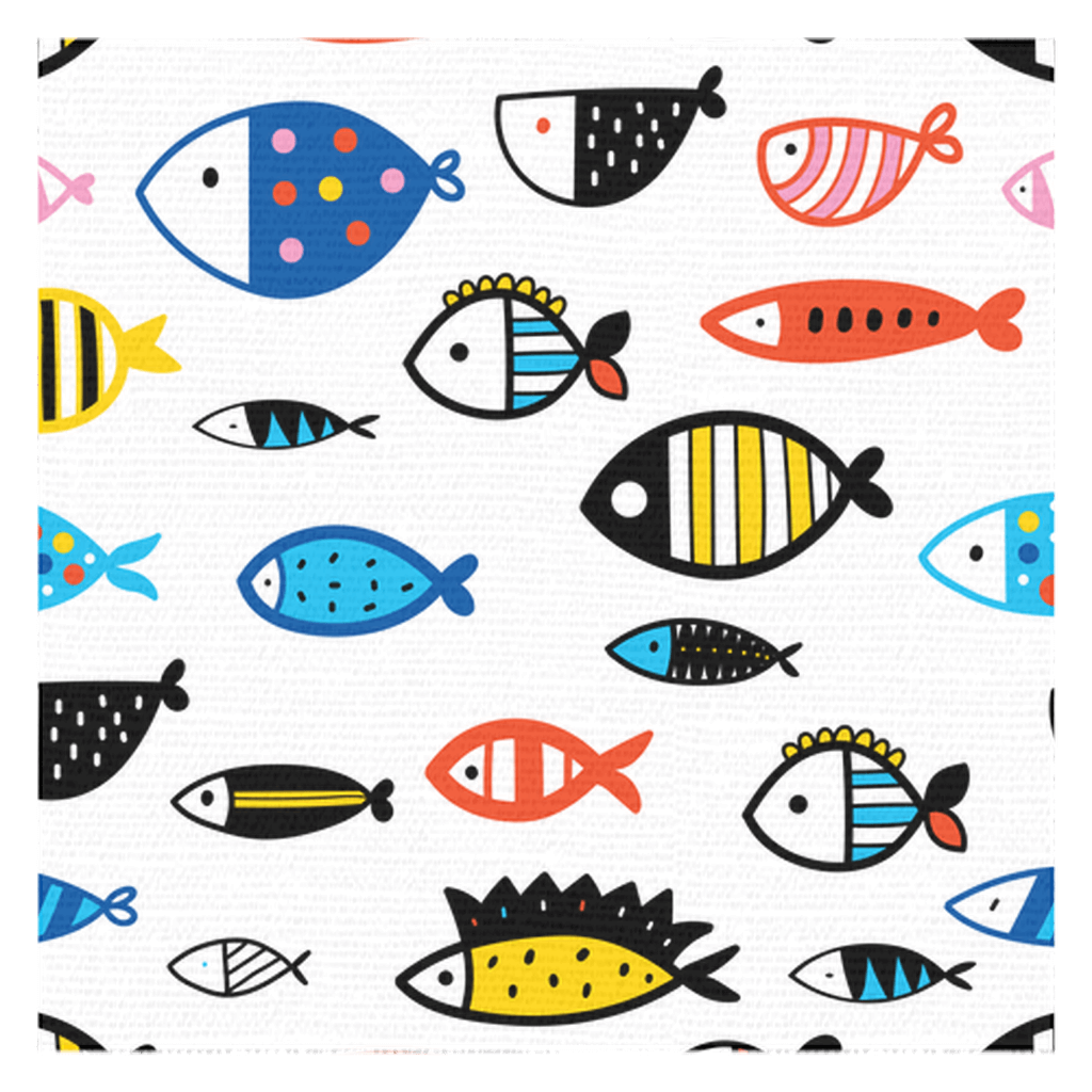 Colorful cartoon fish print on white fabric tablecloth, perfect for adding an aquatic vibe to your dining or outdoor table.