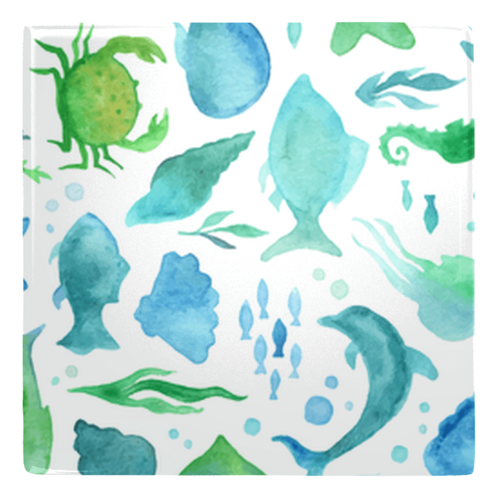 Colorful watercolor sea life design on metal magnet, perfect for fish décor enthusiasts.