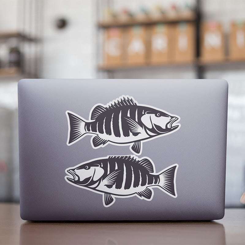 Snapper stickers on a laptop.