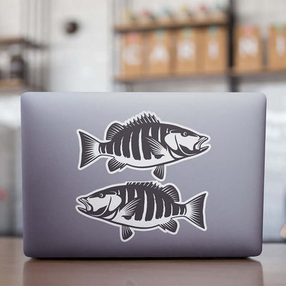 Snapper stickers on a laptop.