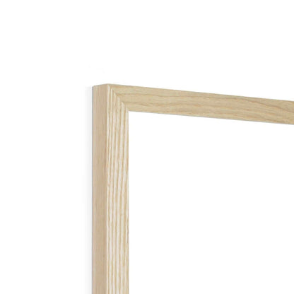 Wooden picture frame corner in light finish against white background.