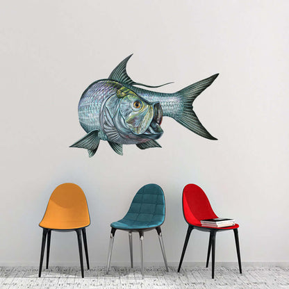 Large fish wall decal above colorful chairs in modern room decor.