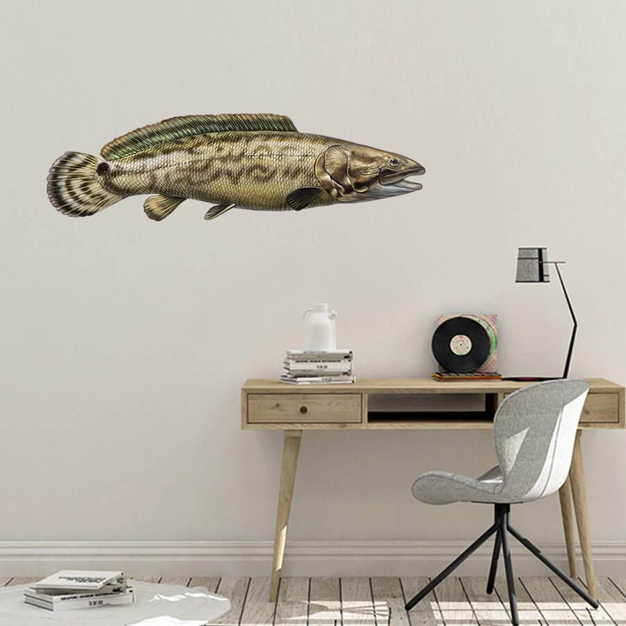 Fish wall decor above a minimalist desk and chair in a modern home office setting.