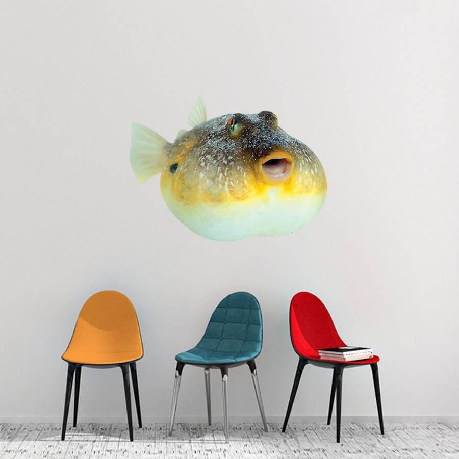 Pufferfish wall decal above colorful chairs in modern room, perfect for fish wall stickers for bedroom